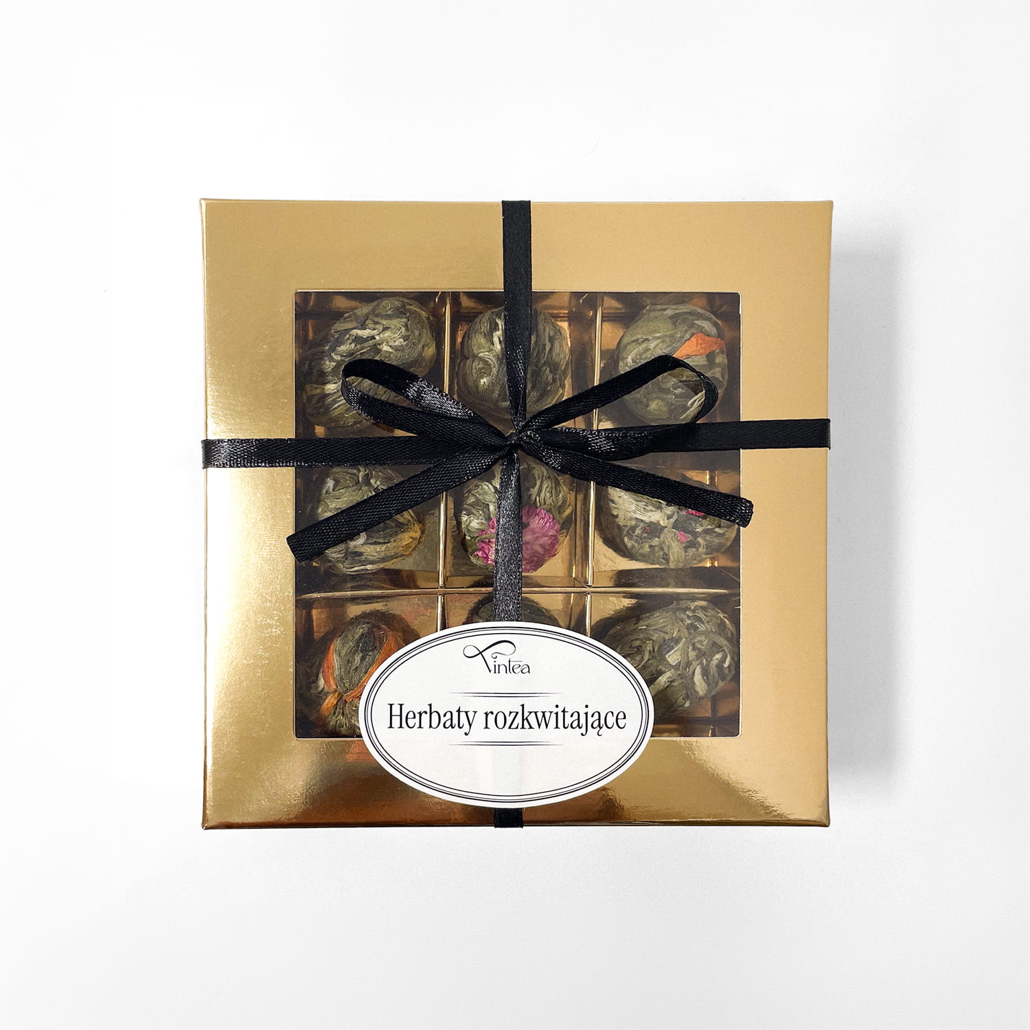 Złota bombonierka herbat rozkwitających